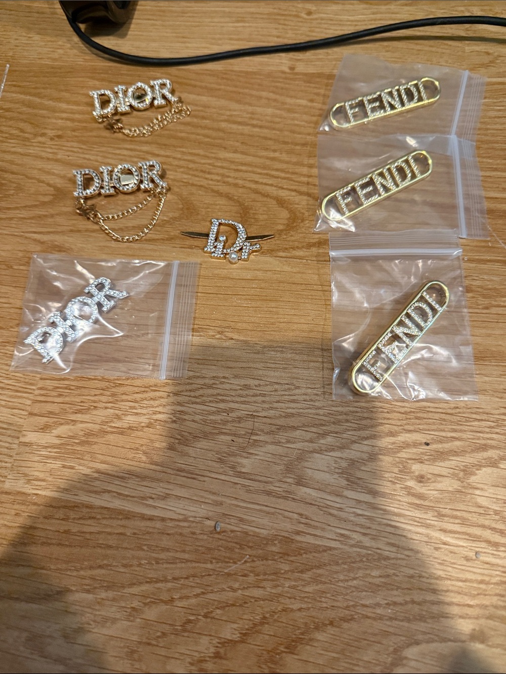 Fashion Gold & Silver Logo Pins